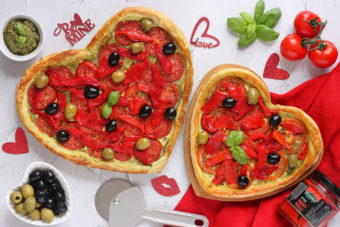 a heart shaped puff pastry tart topped with Fragata Olives