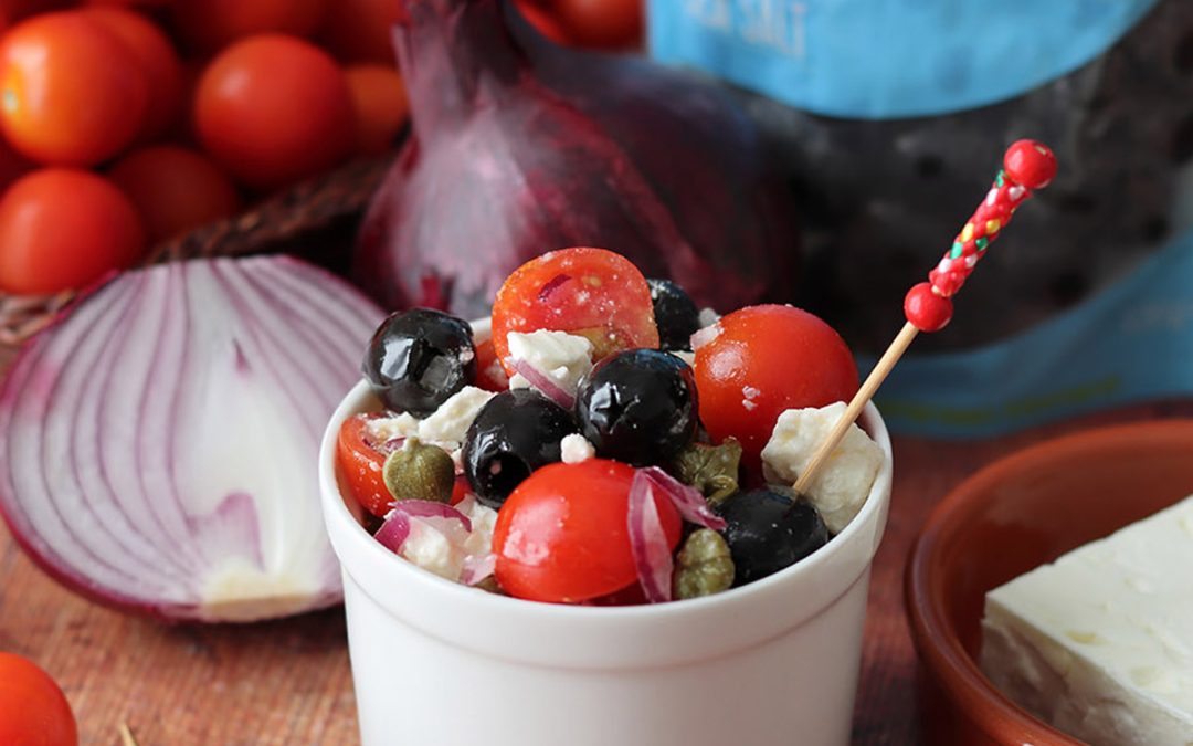 Fragata black olives marinated with feta cheese, red onion, capers and cherry tomatoes